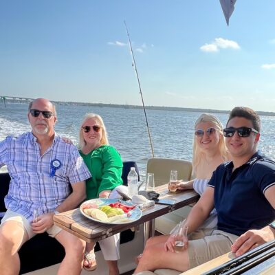 family enjoying yacht charter in Charleston Harbor