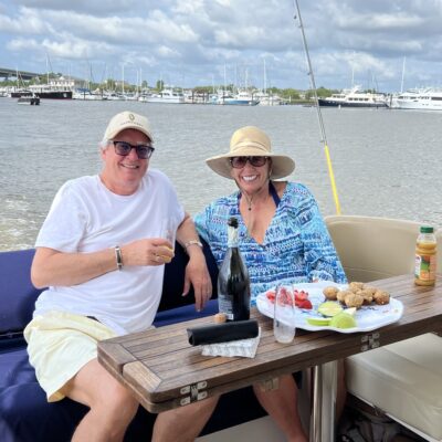 couple having lunch on a boat charter in Charleston SC