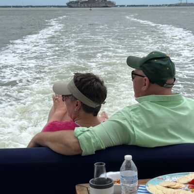 Couple taking in scenic views on a luxury boat charter in Charleston SC